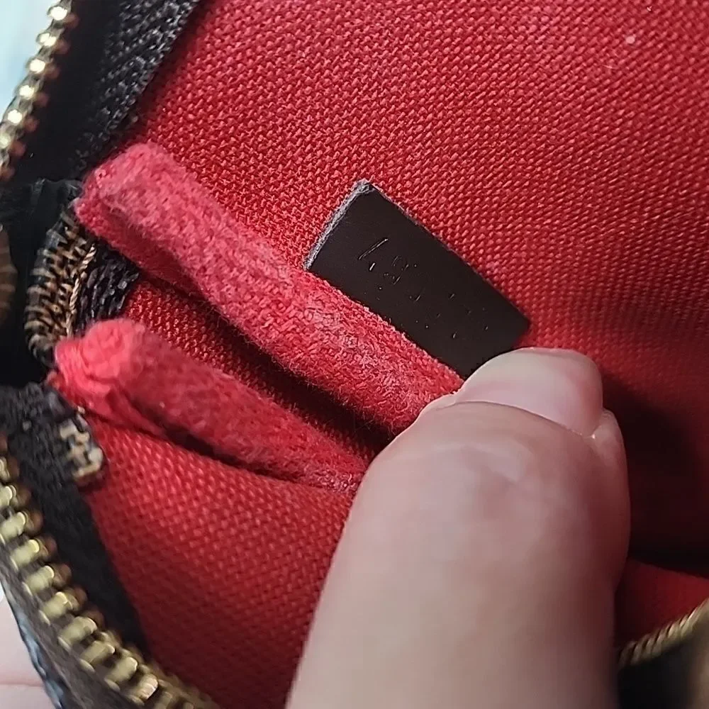 Authentic Louis Vuitton Damier Ebene Mini Pochette